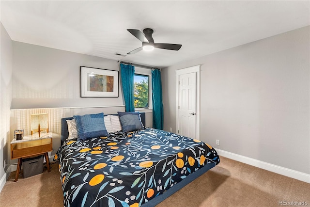 bedroom featuring visible vents, carpet flooring, a ceiling fan, and baseboards