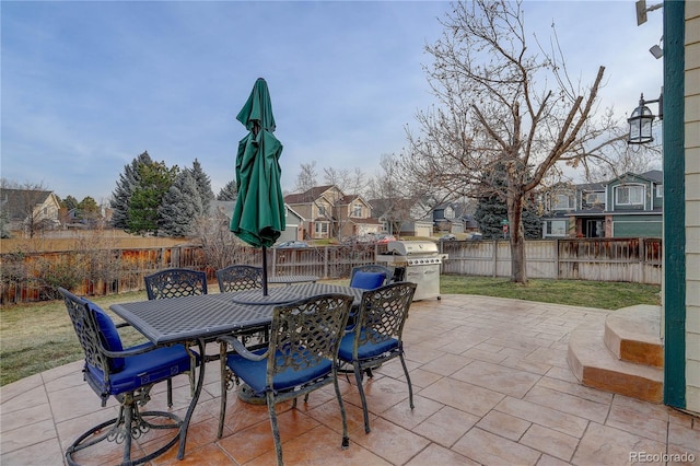 view of patio with a grill