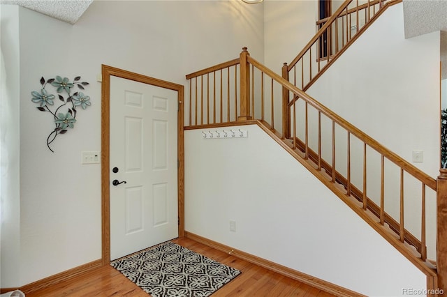 entrance foyer featuring hardwood / wood-style floors