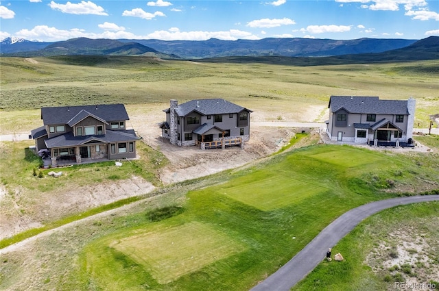 bird's eye view featuring a mountain view and a rural view