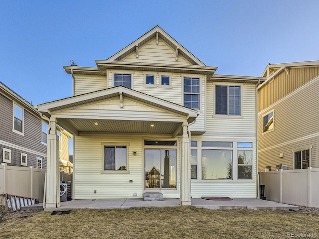 back of property featuring a patio, ac unit, and fence