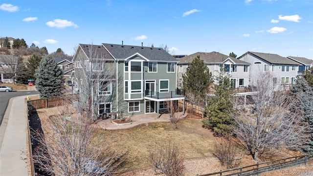 1929 Baguette Dr, Castle Rock, CO 80108 - back of house with a patio area and a residential view