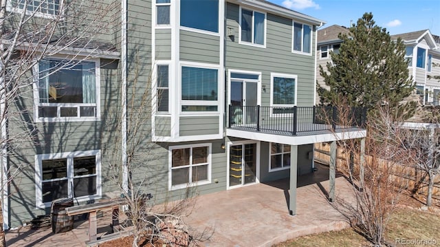 1929 Baguette Dr, Castle Rock, CO 80108 - back of house with a patio area and a balcony