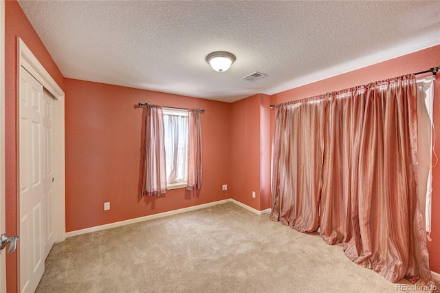 1929 Baguette Dr, Castle Rock, CO 80108 - carpeted spare room with a textured ceiling and baseboards