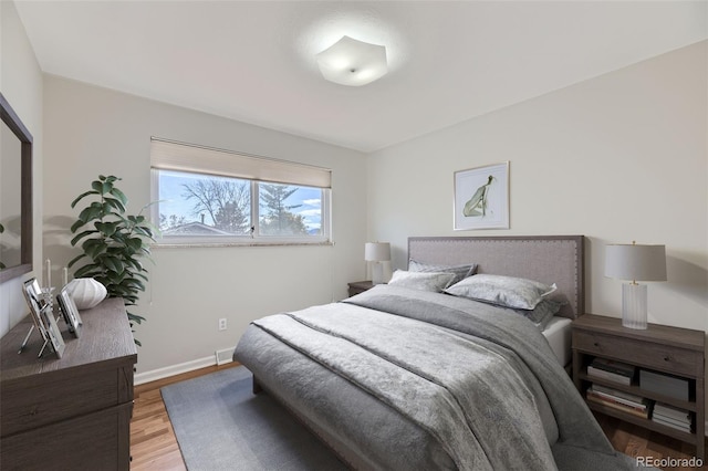 bedroom featuring hardwood / wood-style floors