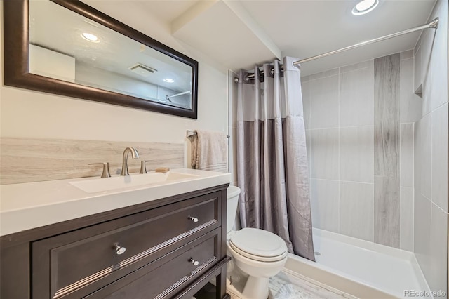 bathroom with toilet, a shower with curtain, and vanity