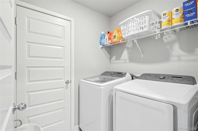 laundry room with washer and dryer