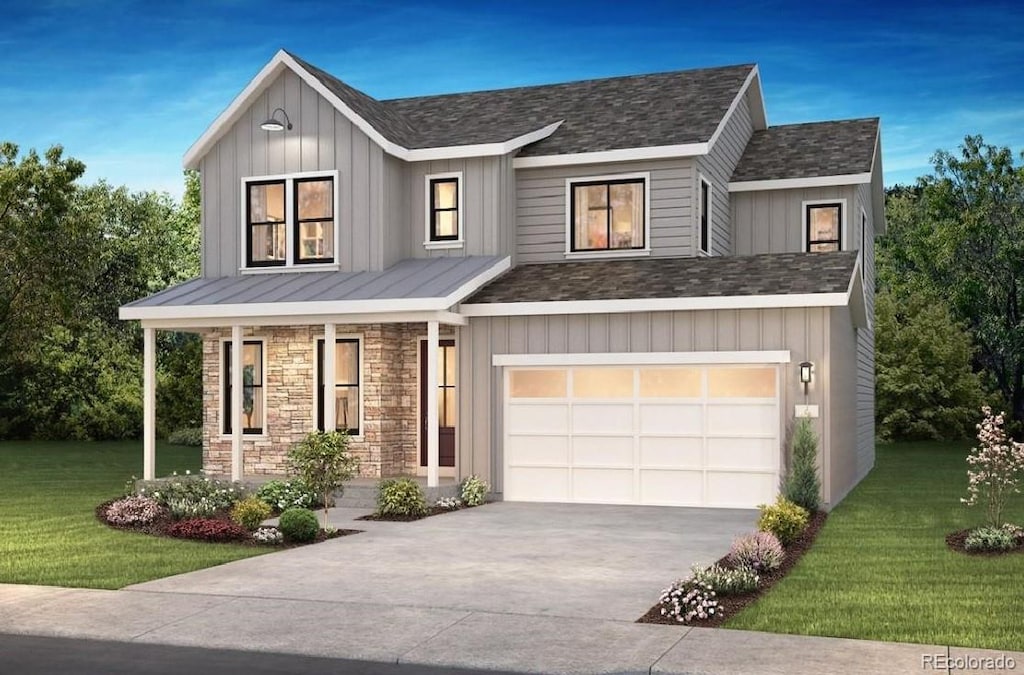 view of front of home featuring a porch, a garage, and a front yard