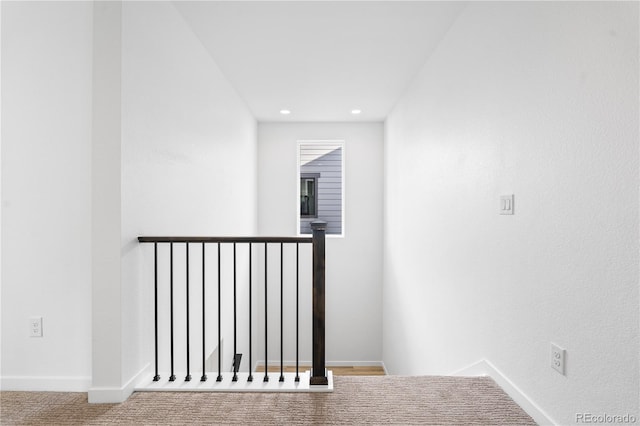 staircase with recessed lighting, carpet flooring, and baseboards