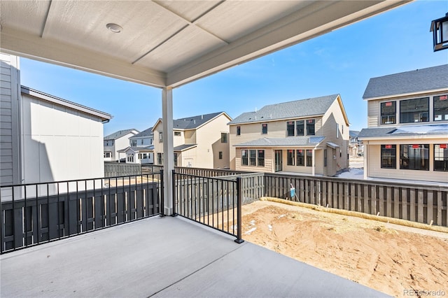 balcony featuring a residential view