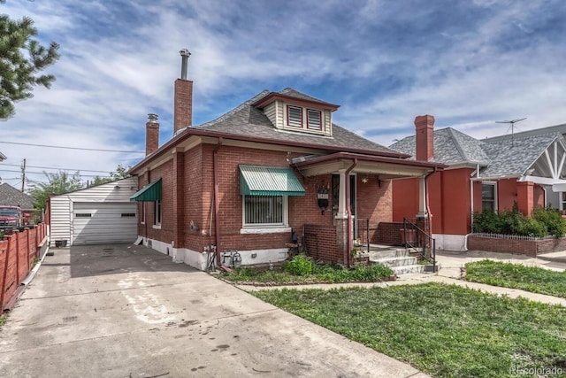 2421 W 38th Ave, Denver, CO 80211 - bungalow featuring a chimney, brick siding, an outdoor structure, a detached garage, and roof with shingles