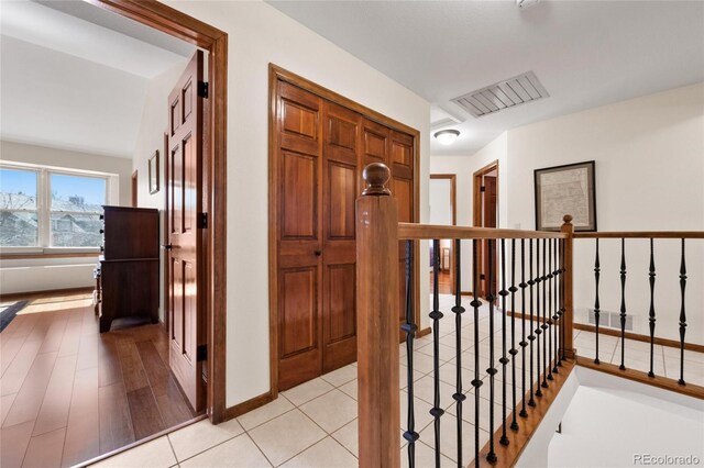 3151 E 134th Cir, Thornton, CO 80241 - corridor with baseboards and an upstairs landing