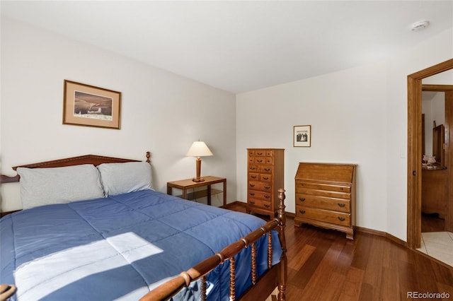 3151 E 134th Cir, Thornton, CO 80241 - bedroom featuring wood finished floors and baseboards
