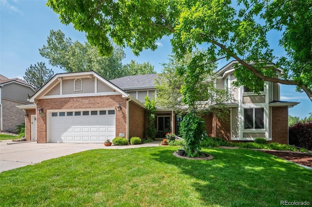 4161 W Lake Cir N, Littleton, CO 80123 - view of front of property featuring a garage, a front lawn, concrete driveway, and brick siding