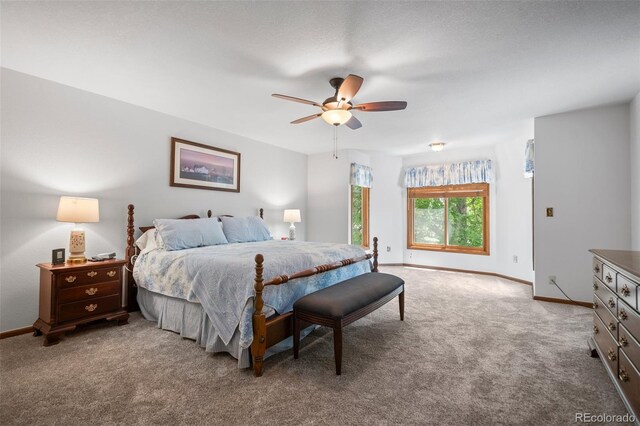 4161 W Lake Cir N, Littleton, CO 80123 - bedroom featuring carpet floors, baseboards, and ceiling fan