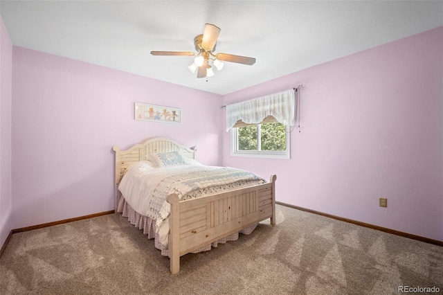4161 W Lake Cir N, Littleton, CO 80123 - carpeted bedroom with baseboards and ceiling fan