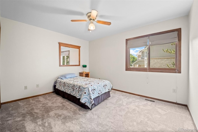 4161 W Lake Cir N, Littleton, CO 80123 - bedroom featuring carpet, baseboards, and ceiling fan