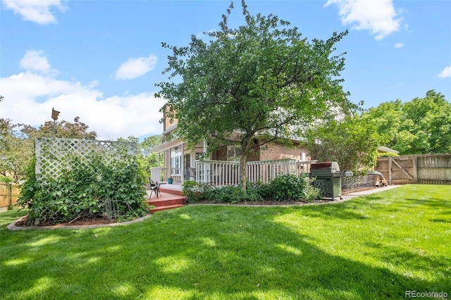 4161 W Lake Cir N, Littleton, CO 80123 - view of yard featuring a deck