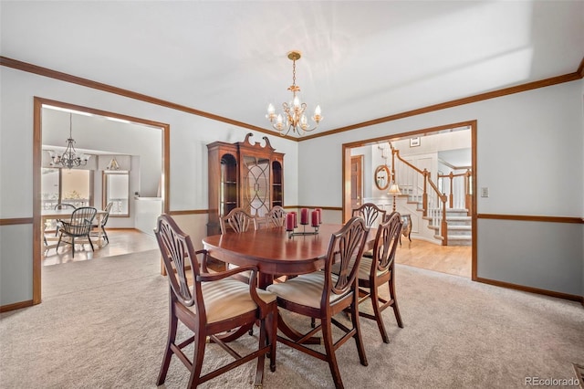 4161 W Lake Cir N, Littleton, CO 80123 - dining area with a chandelier, light carpet, stairway, and crown molding