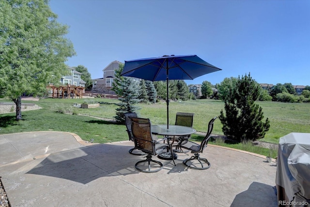 22921 E Euclid Cir, Aurora, CO 80016 - view of patio / terrace with outdoor dining area and a grill