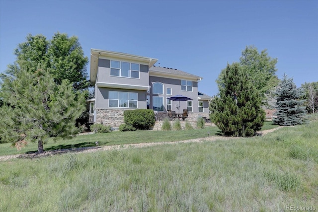 22921 E Euclid Cir, Aurora, CO 80016 - back of house with stucco siding and stone siding