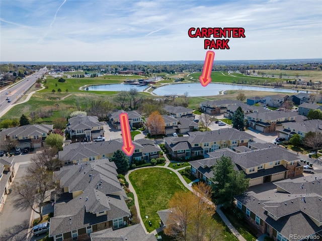 3000 E 112th Ave Unit 102, Northglenn, CO 80233 - aerial view of property's location with a nearby body of water and nearby suburban area