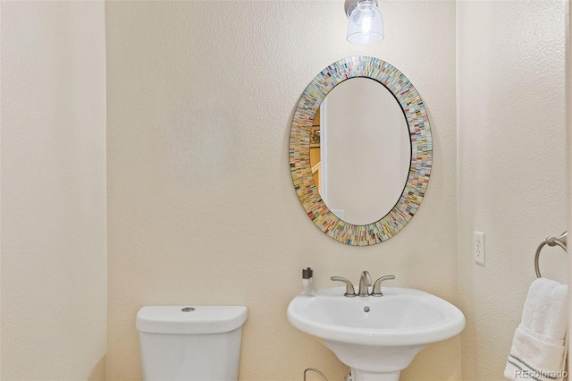 3000 E 112th Ave Unit 102, Northglenn, CO 80233 - bathroom with a sink and toilet