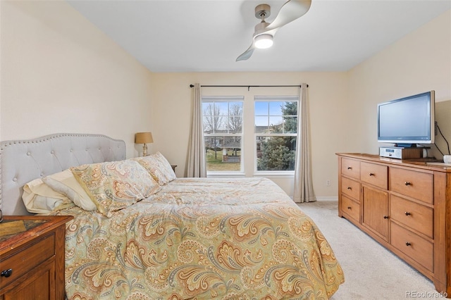 3000 E 112th Ave Unit 102, Northglenn, CO 80233 - bedroom featuring light colored carpet and ceiling fan
