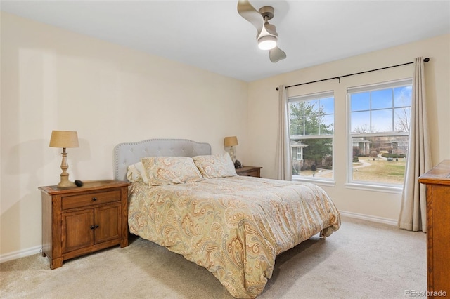 3000 E 112th Ave Unit 102, Northglenn, CO 80233 - bedroom featuring light colored carpet and a ceiling fan