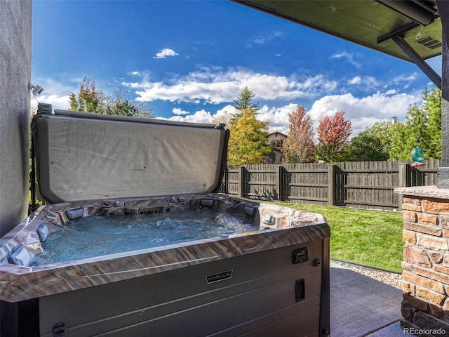 view of patio / terrace featuring a hot tub