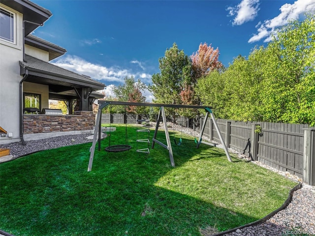 view of yard with a playground