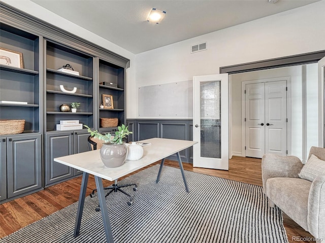 office space with dark hardwood / wood-style floors