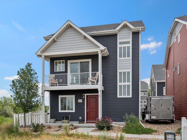 view of front of property with a balcony