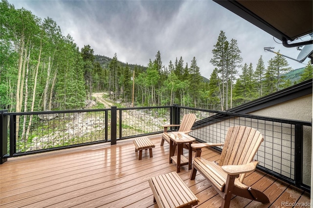 25735 County Road 295, Nathrop, CO 81236 - wooden deck with a forest view