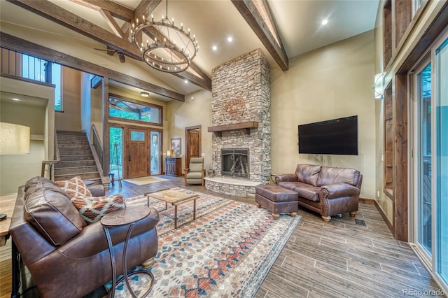 25735 County Road 295, Nathrop, CO 81236 - living room with beamed ceiling, high vaulted ceiling, a fireplace, wood finished floors, and recessed lighting