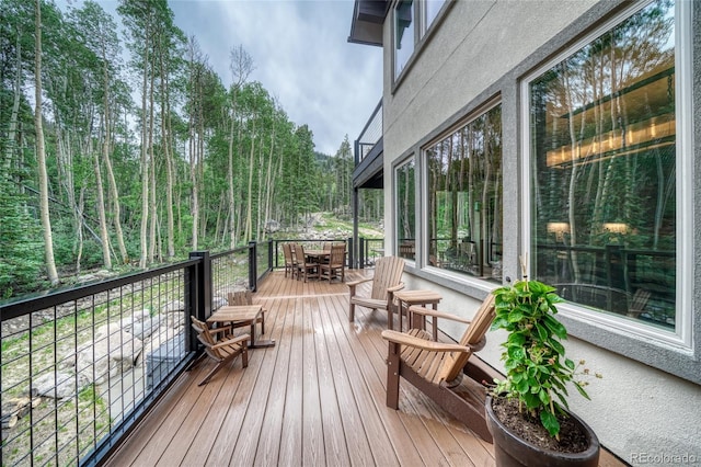 25735 County Road 295, Nathrop, CO 81236 - wooden deck with outdoor dining area