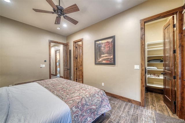 25735 County Road 295, Nathrop, CO 81236 - bedroom featuring a walk in closet, wood finished floors, recessed lighting, ceiling fan, and ensuite bath