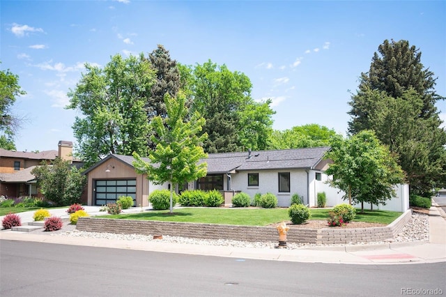 2998 S Adams St, Denver, CO 80210 - ranch-style house featuring driveway, a front lawn, and a garage