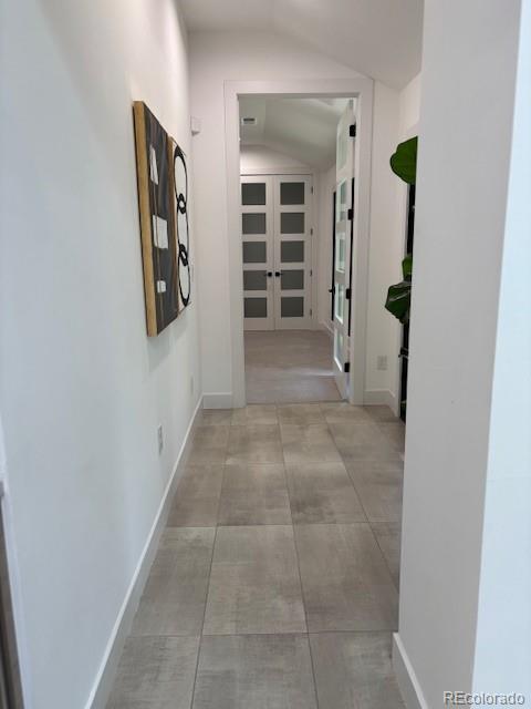 2998 S Adams St, Denver, CO 80210 - corridor with french doors and vaulted ceiling