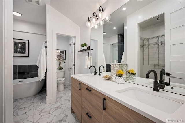 2998 S Adams St, Denver, CO 80210 - bathroom with double vanity, a soaking tub, and recessed lighting