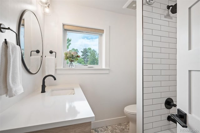2998 S Adams St, Denver, CO 80210 - full bathroom with baseboards and vanity
