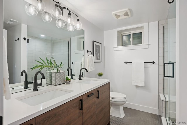 2998 S Adams St, Denver, CO 80210 - bathroom featuring double vanity, a shower stall, and tile patterned flooring