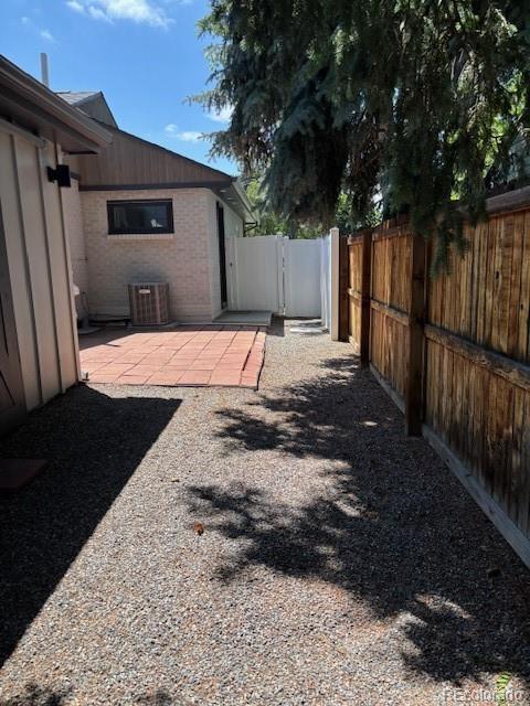 2998 S Adams St, Denver, CO 80210 - view of yard featuring a patio