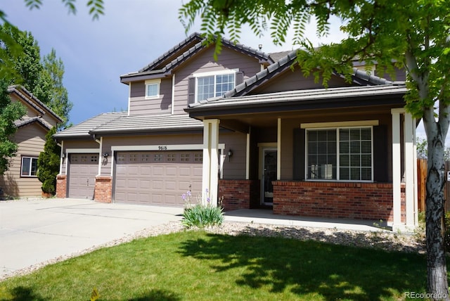 9616 Nucla St, Commerce City, CO 80022 - view of front of house featuring brick siding, driveway, an attached garage, and a tile roof