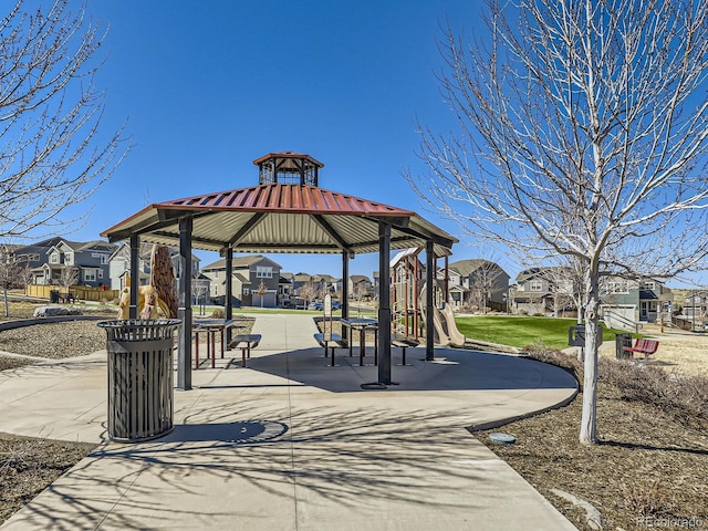 view of property's community with a residential view and a gazebo