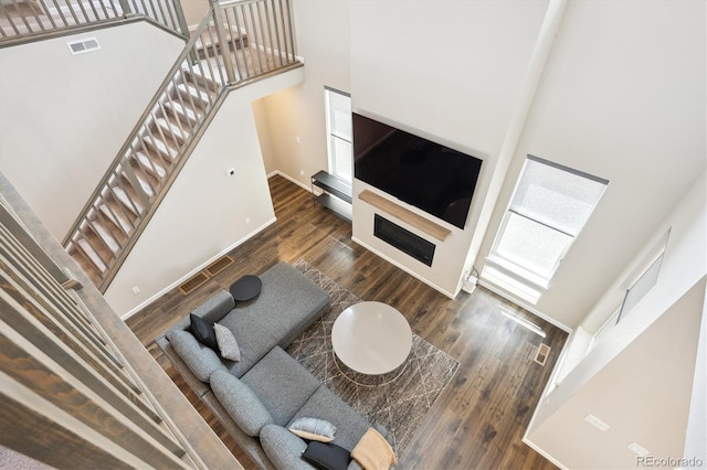 10557 Eby Cir, Lone Tree, CO 80124 - living room with a high ceiling and wood finished floors