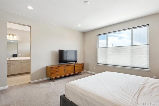 10557 Eby Cir, Lone Tree, CO 80124 - bedroom featuring light colored carpet, recessed lighting, and connected bathroom