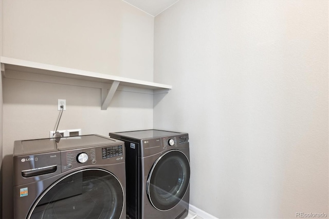 10557 Eby Cir, Lone Tree, CO 80124 - washroom with independent washer and dryer and baseboards
