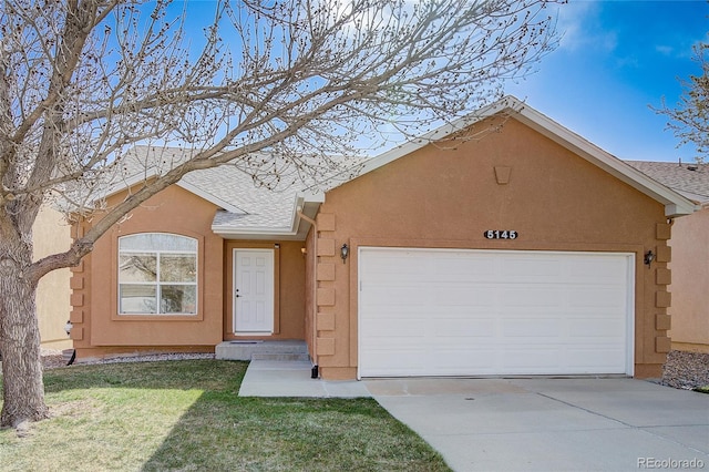 ranch-style home with a garage