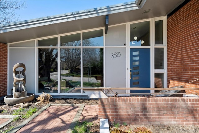 3895 Chimayo Rd, Littleton, CO 80123 - entrance to property featuring brick siding